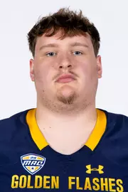 Headshot of a Kent State football player wearing a navy blue jersey with 'Golden Flashes' text in gold letters