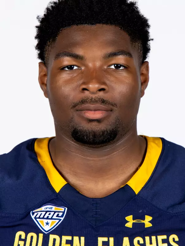 Headshot of a Kent State football player wearing a navy blue jersey with 'Golden Flashes' text in gold letters
