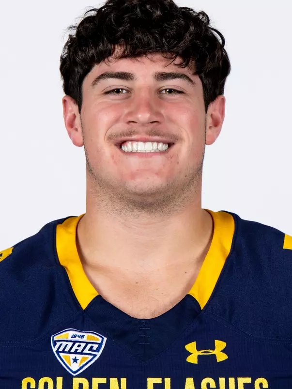 Headshot of a Kent State football player wearing a navy blue jersey with 'Golden Flashes' text in gold letters