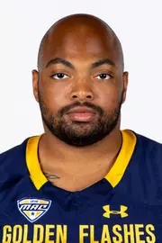 Headshot of a Kent State football player wearing a navy blue jersey with 'Golden Flashes' text in gold letters
