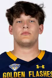 Headshot of a Kent State football player wearing a navy blue jersey with 'Golden Flashes' text in gold letters