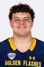 Headshot of a Kent State football player wearing a navy blue jersey with 'Golden Flashes' text in gold letters