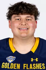 Headshot of a Kent State football player wearing a navy blue jersey with 'Golden Flashes' text in gold letters