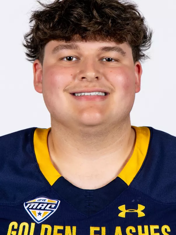 Headshot of a Kent State football player wearing a navy blue jersey with 'Golden Flashes' text in gold letters