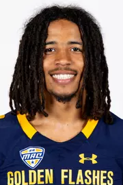 Headshot of a Kent State football player wearing a navy blue jersey with 'Golden Flashes' text in gold letters
