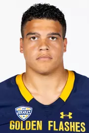 Headshot of a Kent State football player wearing a navy blue jersey with 'Golden Flashes' text in gold letters