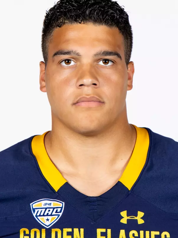 Headshot of a Kent State football player wearing a navy blue jersey with 'Golden Flashes' text in gold letters