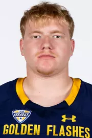 Headshot of a Kent State football player wearing a navy blue jersey with 'Golden Flashes' text in gold letters