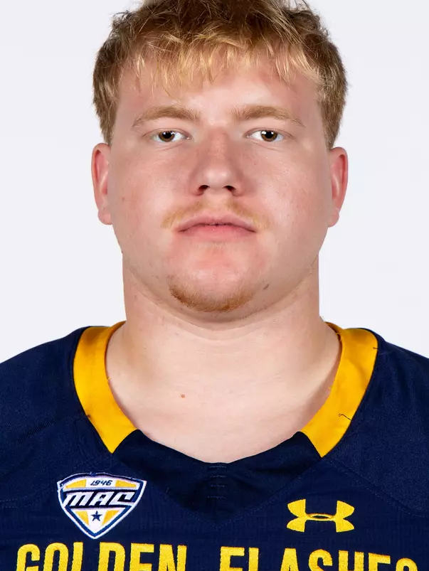 Headshot of a Kent State football player wearing a navy blue jersey with 'Golden Flashes' text in gold letters