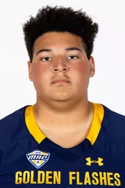 Headshot of a Kent State football player wearing a navy blue jersey with 'Golden Flashes' text in gold letters