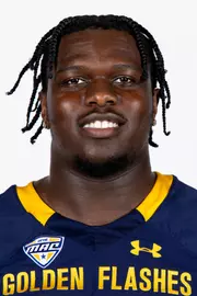 Headshot of a Kent State football player wearing a navy blue jersey with 'Golden Flashes' text in gold letters