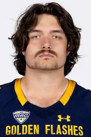 Headshot of a Kent State football player wearing a navy blue jersey with 'Golden Flashes' text in gold letters