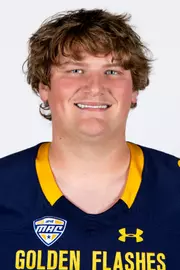 Headshot of a Kent State football player wearing a navy blue jersey with 'Golden Flashes' text in gold letters