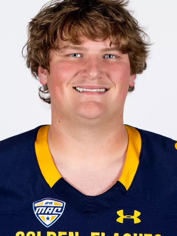 Headshot of a Kent State football player wearing a navy blue jersey with 'Golden Flashes' text in gold letters