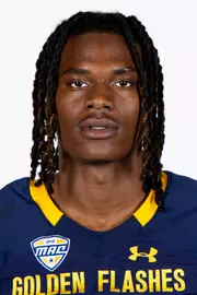Headshot of a Kent State football player wearing a navy blue jersey with 'Golden Flashes' text in gold letters