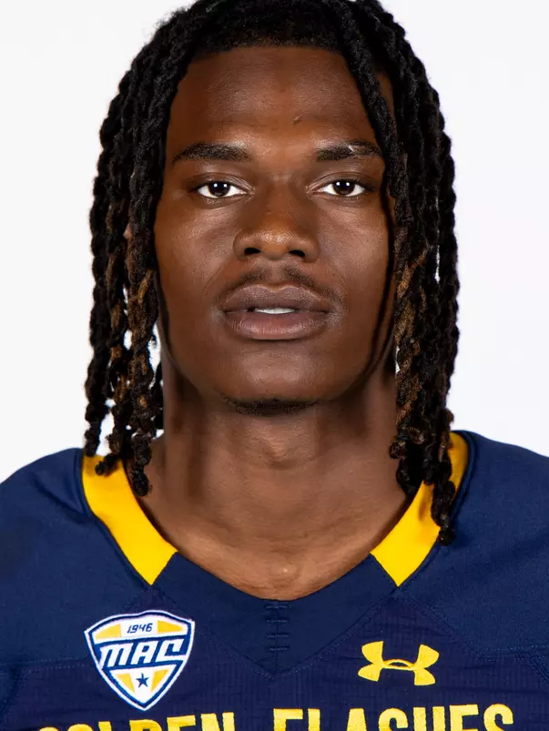 Headshot of a Kent State football player wearing a navy blue jersey with 'Golden Flashes' text in gold letters