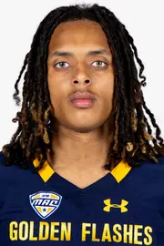 Headshot of a Kent State football player wearing a navy blue jersey with 'Golden Flashes' text in gold letters