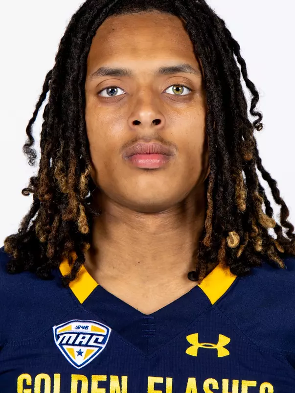 Headshot of a Kent State football player wearing a navy blue jersey with 'Golden Flashes' text in gold letters