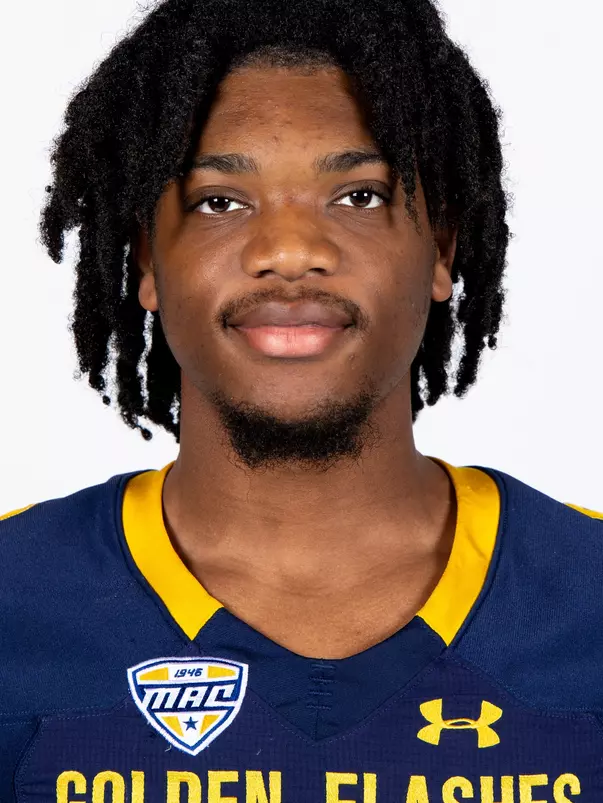 Headshot of a Kent State football player wearing a navy blue jersey with 'Golden Flashes' text in gold letters