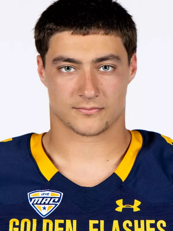 Headshot of a Kent State football player wearing a navy blue jersey with 'Golden Flashes' text in gold letters