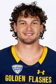 Headshot of a Kent State football player wearing a navy blue jersey with 'Golden Flashes' text in gold letters