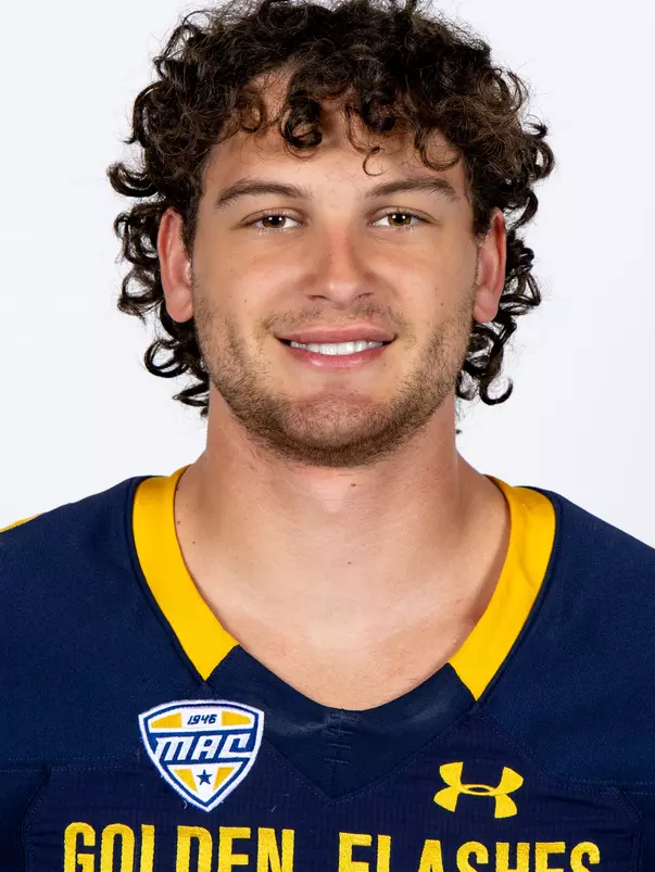 Headshot of a Kent State football player wearing a navy blue jersey with 'Golden Flashes' text in gold letters