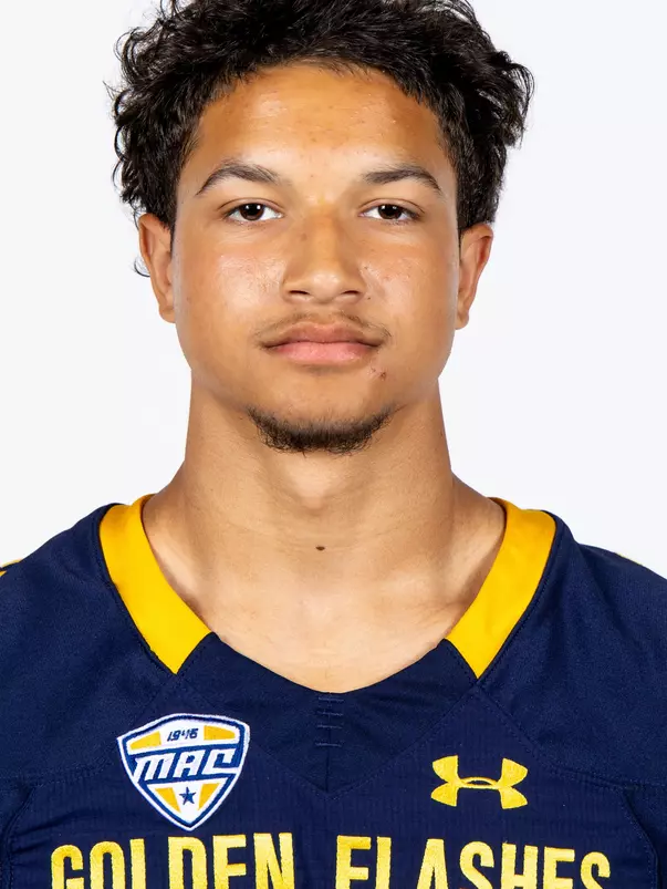 Headshot of a Kent State football player wearing a navy blue jersey with 'Golden Flashes' text in gold letters