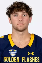 Headshot of a Kent State football player wearing a navy blue jersey with 'Golden Flashes' text in gold letters