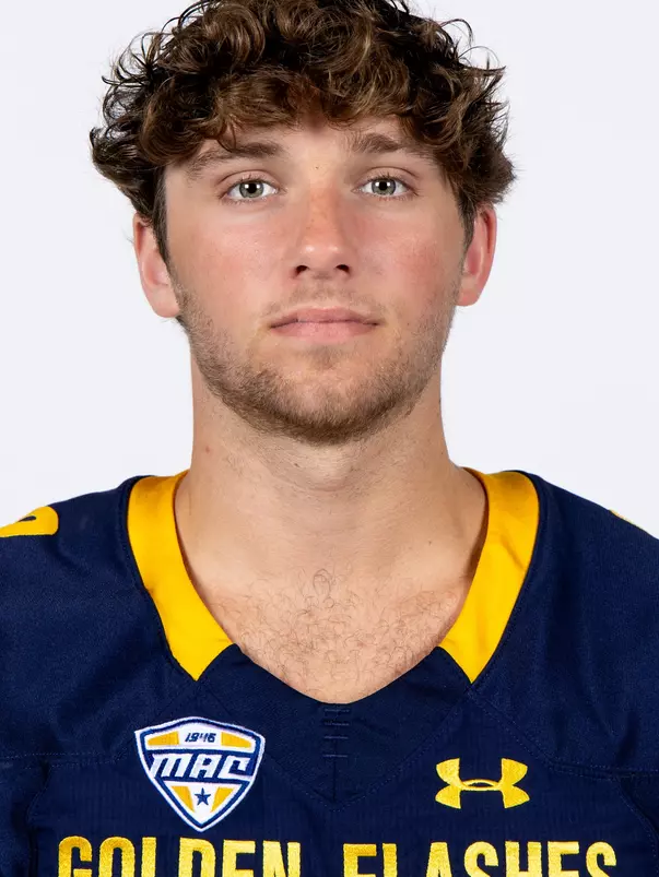 Headshot of a Kent State football player wearing a navy blue jersey with 'Golden Flashes' text in gold letters