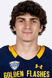 Headshot of a Kent State football player wearing a navy blue jersey with 'Golden Flashes' text in gold letters