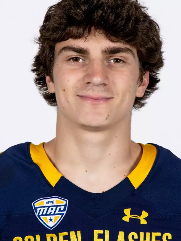 Headshot of a Kent State football player wearing a navy blue jersey with 'Golden Flashes' text in gold letters