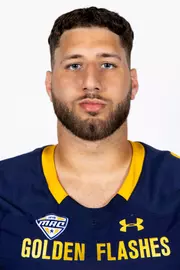 Headshot of a Kent State football player wearing a navy blue jersey with 'Golden Flashes' text in gold letters
