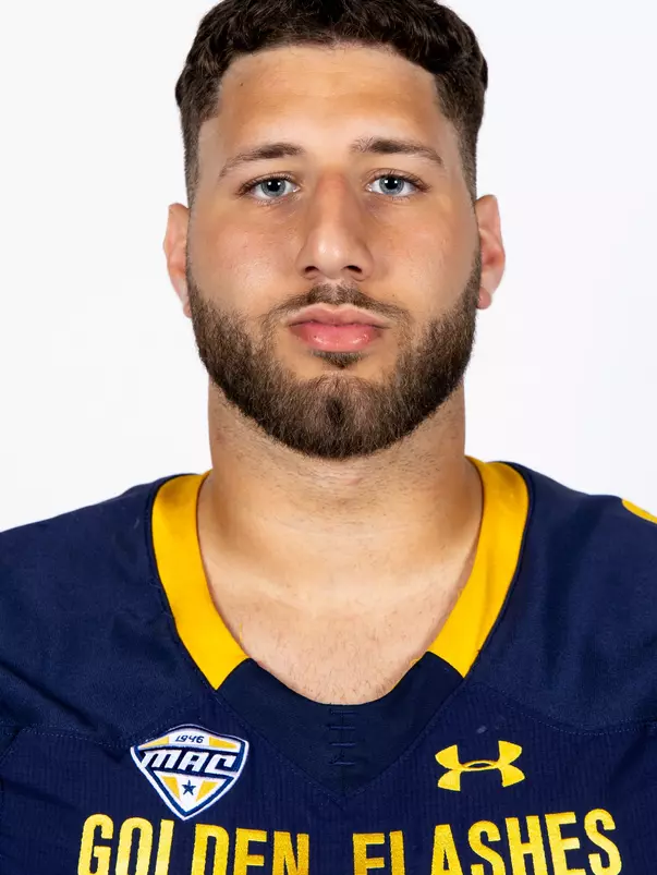 Headshot of a Kent State football player wearing a navy blue jersey with 'Golden Flashes' text in gold letters
