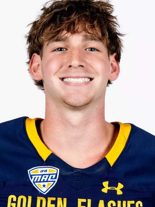 Headshot of a Kent State football player wearing a navy blue jersey with 'Golden Flashes' text in gold letters