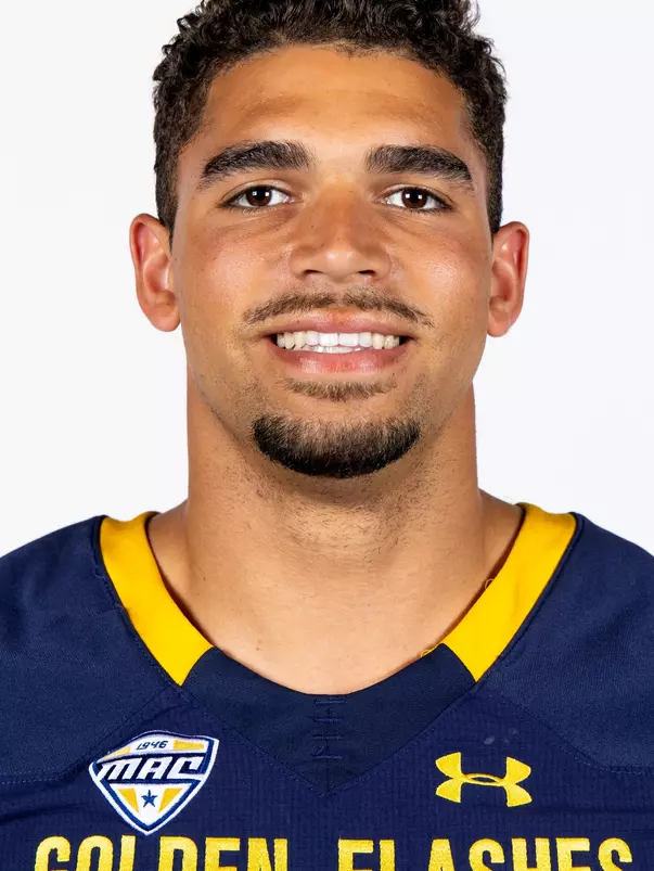 Headshot of a Kent State football player wearing a navy blue jersey with 'Golden Flashes' text in gold letters
