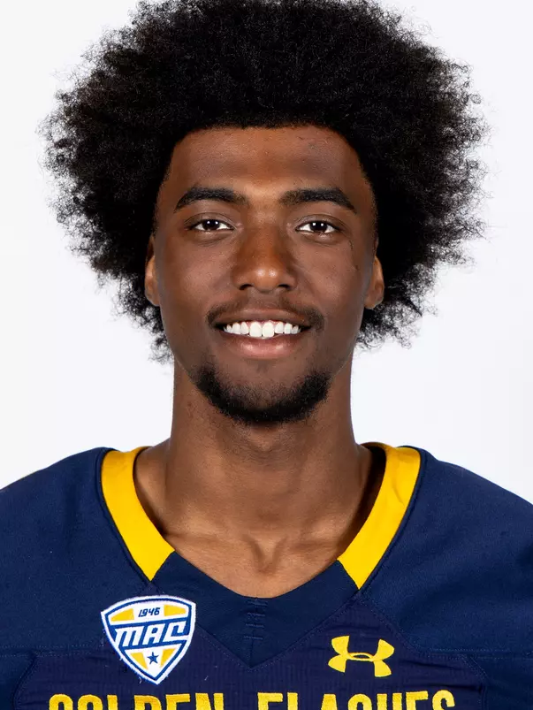 Headshot of a Kent State football player wearing a navy blue jersey with 'Golden Flashes' text in gold letters