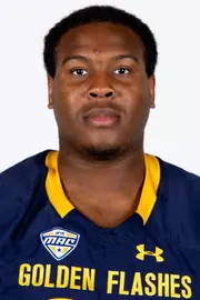 Headshot of a Kent State football player wearing a navy blue jersey with 'Golden Flashes' text in gold letters