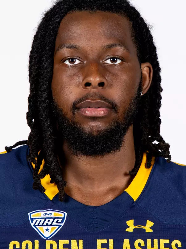 Headshot of a Kent State football player wearing a navy blue jersey with 'Golden Flashes' text in gold letters