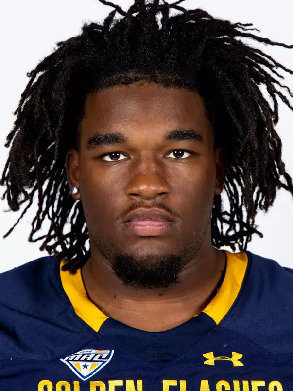 Headshot of a Kent State football player wearing a navy blue jersey with 'Golden Flashes' text in gold letters