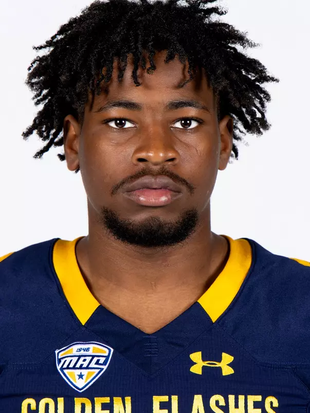 Headshot of a Kent State football player wearing a navy blue jersey with 'Golden Flashes' text in gold letters