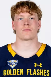 Headshot of a Kent State football player wearing a navy blue jersey with 'Golden Flashes' text in gold letters