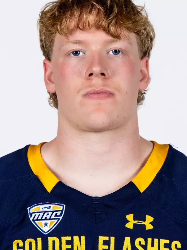 Headshot of a Kent State football player wearing a navy blue jersey with 'Golden Flashes' text in gold letters