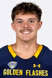 Headshot of a Kent State football player wearing a navy blue jersey with 'Golden Flashes' text in gold letters