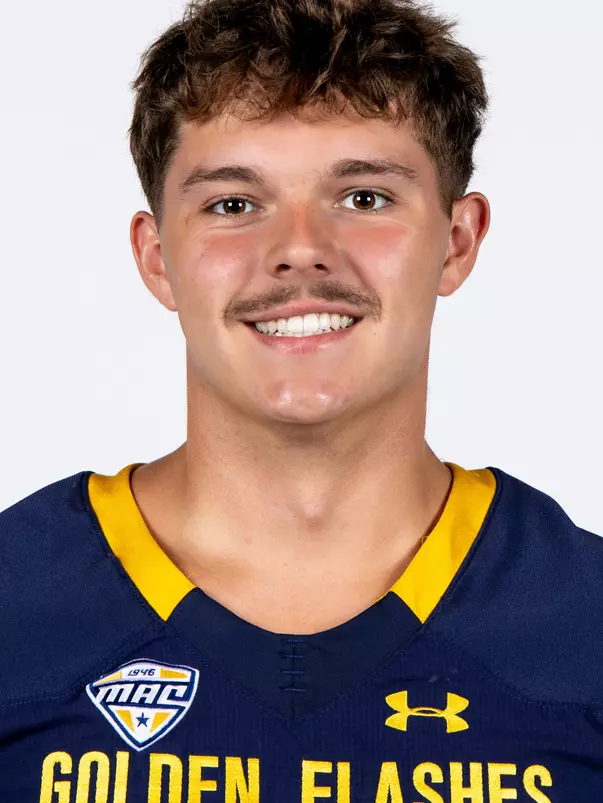 Headshot of a Kent State football player wearing a navy blue jersey with 'Golden Flashes' text in gold letters