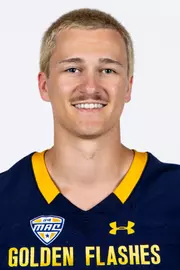 Headshot of a Kent State football player wearing a navy blue jersey with 'Golden Flashes' text in gold letters