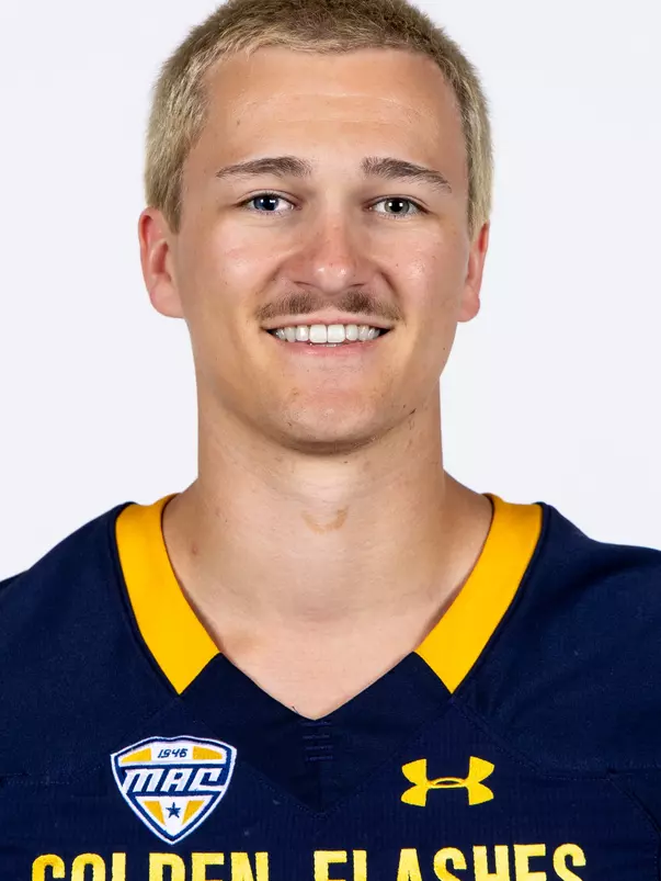 Headshot of a Kent State football player wearing a navy blue jersey with 'Golden Flashes' text in gold letters