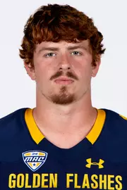 Headshot of a Kent State football player wearing a navy blue jersey with 'Golden Flashes' text in gold letters