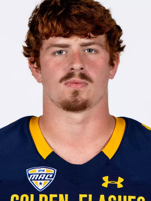 Headshot of a Kent State football player wearing a navy blue jersey with 'Golden Flashes' text in gold letters