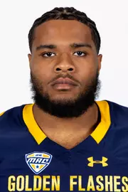 Headshot of a Kent State football player wearing a navy blue jersey with 'Golden Flashes' text in gold letters