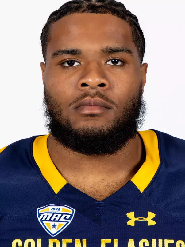 Headshot of a Kent State football player wearing a navy blue jersey with 'Golden Flashes' text in gold letters